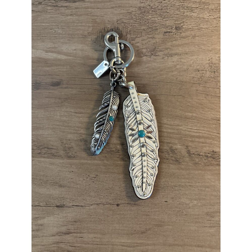 Coach western rivets feather charm